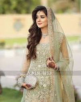 Atif Riaz Green Heavy Embroidered Net Suit